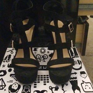 Black buckle platforms